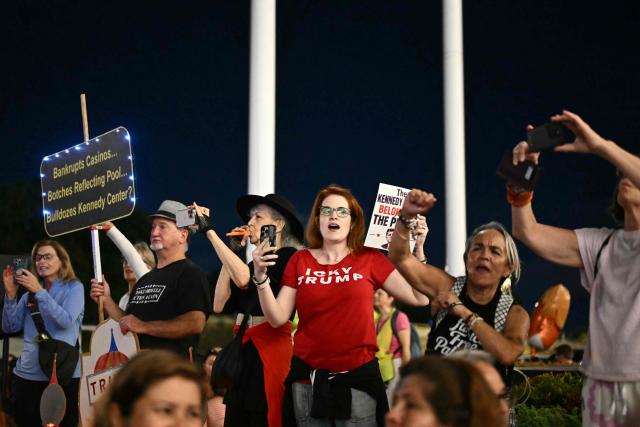 People gather during a rally in support of the Kennedy Center in Washington, DC, on September 18, 2026. (Photo by Kent NISHIMURA / AFP)