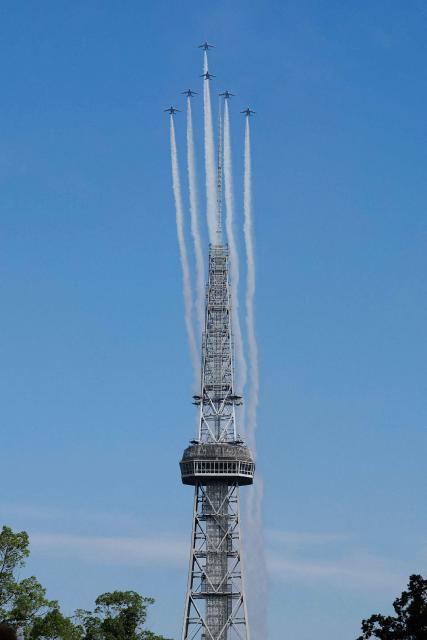 Kawasaki T-4s of the Japan Air Self-Defense Force's Blue Impulse aerobatic demonstration team perform a flypast ahead of the opening ceremony for the 2026 Asian Games in Nagoya on September 19, 2026. (Photo by JIJI Press / AFP) / Japan OUT