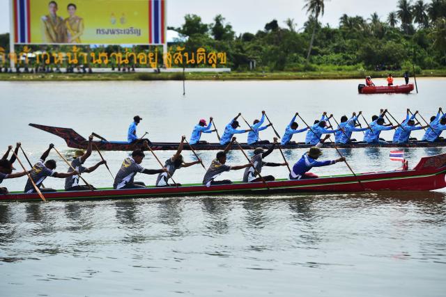 Participants compete in a dragon boat race during the annual four day rowing competition  involving teams from Thailand and Malaysia, in Thailand's troubled southern Narathiwat province on September 19, 2026. (Photo by Madaree TOHLALA / AFP)