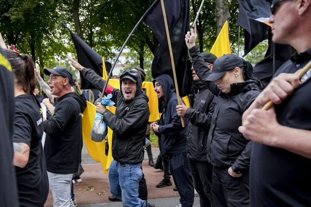 Demonstrators take part in a far-right rally under the banner 'We Are The People' at the Malieveld in The Hague on September 19, 2026. Dutch riot police clashed on September 19, 2026, with around 500 far-right protesters, who pelted them with fireworks and other projectiles after chanting anti-Semitic slogans at a rally in the centre of The Hague. (Photo by Lina Selg / ANP / AFP) / Netherlands OUT