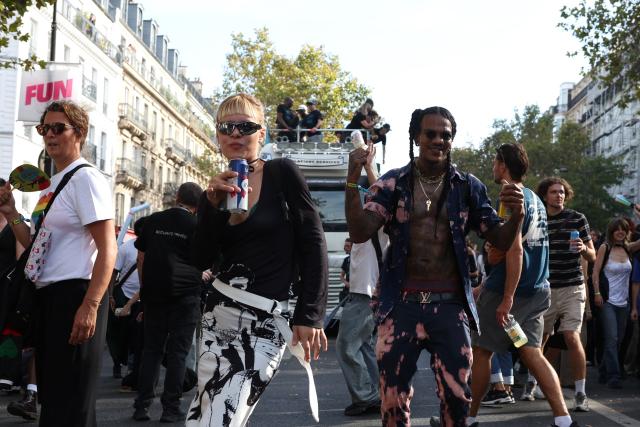 Participants dance in the street during the Techno Parade 2026 in Paris on September 19, 2026. (Photo by Charlotte SIEMON / AFP)