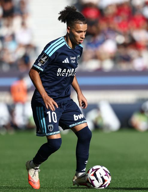 Paris FC's French midfielder #10 Ilan Kebbal controls the ball during the French L1 football match between Paris FC and RC Strasbourg at Stade Jean Bouin in Paris on September 19, 2026. (Photo by FRANCK FIFE / AFP)