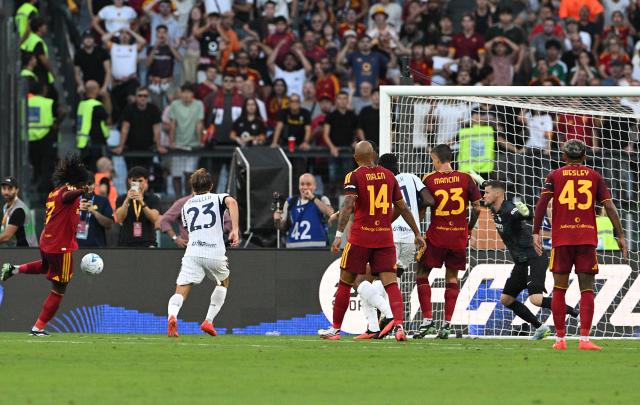 Roma's French midfielder #17 Manu Kone (L) shoots and scores his second goal during the Italian Serie A football match between AS Roma and Inter Milan at The Olympic Stadium in Rome on September 19, 2026. (Photo by Andreas SOLARO / AFP)
