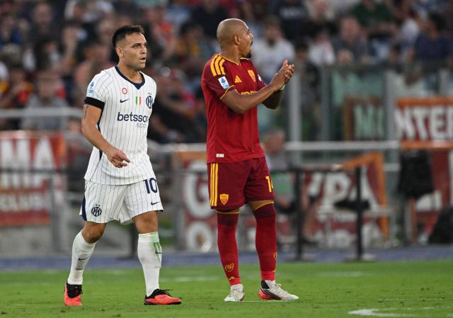 Inter Milan's Argentinian forward #10 Lautaro Martinez celebrates after scoring during the Italian Serie A football match between AS Roma and Inter Milan at The Olympic Stadium in Rome on September 19, 2026. (Photo by Andreas SOLARO / AFP)