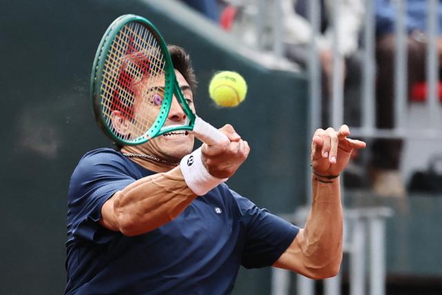 Chile's Christian Garin returns the ball to Spain's Rafael Jodar during their Davis Cup Qualifiers second-round tennis match at the Parque Deportivo Estadio Nacional in Santiago on September 19, 2026. (Photo by Javier TORRES / AFP)