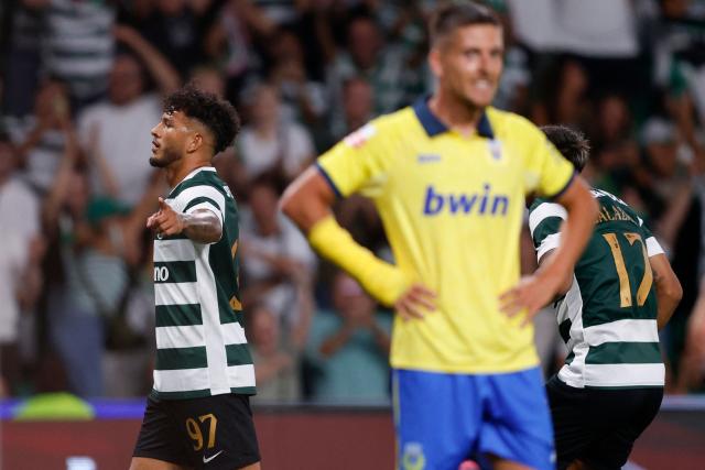Sporting Lisbon's Colombian forward #97 Luis Suarez celebrates scoring his team's second goal during the Portuguese League football match between Sporting CP and FC Arouca at the Jose Alvalade stadium in Lisbon on September 19, 2026. (Photo by FILIPE AMORIM / AFP)
