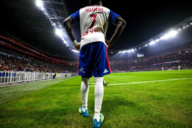 Lyon's Ghanaian forward #07 Ernest Nuamah waits before taking a corner shot during the French L1 football match between Olympique Lyonnais (OL) and Stade Rennais FC (Rennes) at the Parc OL stadium in Decines-Charpieu, central-eastern France, on September 19, 2026. (Photo by OLIVIER CHASSIGNOLE / AFP)