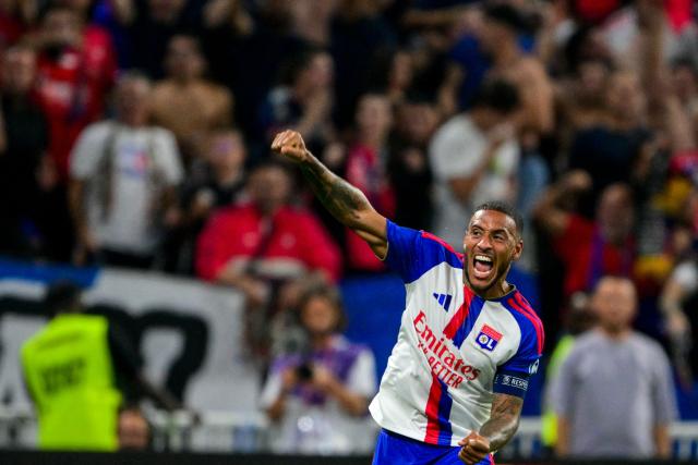Lyon's French midfielder #08 Corentin Tolisso celebrates after scoring a goal during the French L1 football match between Olympique Lyonnais (OL) and Stade Rennais FC (Rennes) at the Parc OL stadium in Decines-Charpieu, central-eastern France, on September 19, 2026. (Photo by OLIVIER CHASSIGNOLE / AFP)