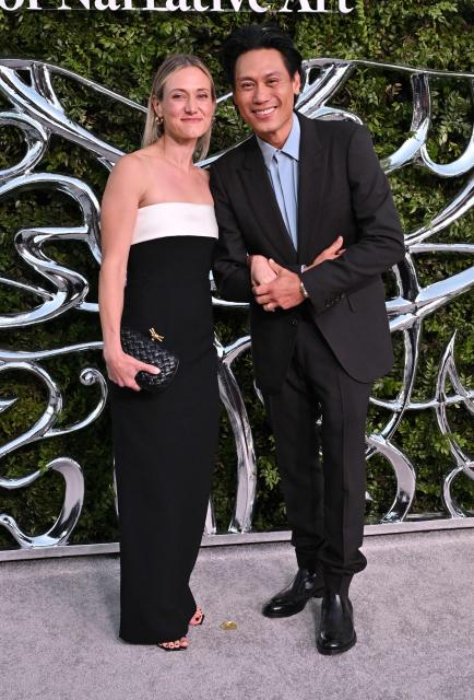 US director Jon M. Chu and his wife gaphic designer Kristin Hodge attend the Lucas Museum of Narrative Art opening night celebration in Los Angeles on September 19, 2026. (Photo by LISA O'CONNOR / AFP)