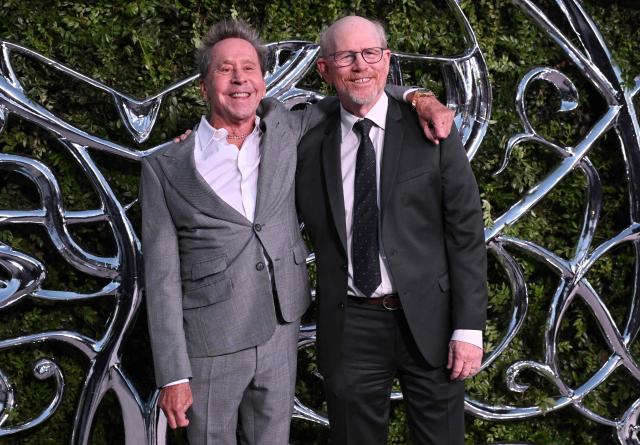 US film producer Brian Grazer (L) and US director and producer Ron Howard (R) attend the Lucas Museum of Narrative Art opening night celebration in Los Angeles on September 19, 2026. (Photo by LISA O'CONNOR / AFP)