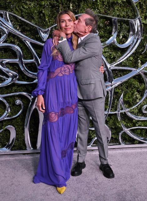 US producer Brian Grazer and his wife Veronica Smiley attend the Lucas Museum of Narrative Art opening night celebration in Los Angeles on September 19, 2026. (Photo by LISA O'CONNOR / AFP)