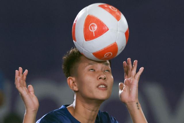 Myanmar's Wai Khin Hnin plays a point against Indonesia's Sumaya during their women's final teqball match at the 2026 Asian Games in Nagoya on September 20, 2026. (Photo by DAVID GRAY / AFP)