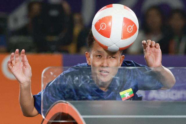 Myanmar's Wai Khin Hnin plays a point against Indonesia's Sumaya during their women's singles final teqball match at the 2026 Asian Games in Nagoya on September 20, 2026. (Photo by DAVID GRAY / AFP)