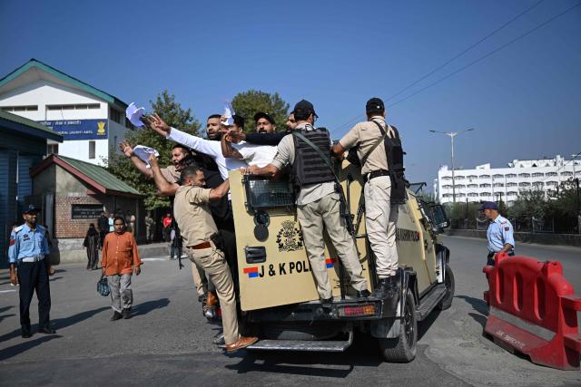 Police personnel detain supporters of the Jammu and Kashmir Apni Party (JKAP) during a protest against the government over unemployment and lack of basic amenities in Srinagar on September 21, 2026. (Photo by Tauseef MUSTAFA / AFP)