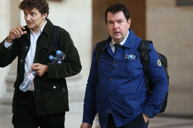 Yann Le Bras (R), lawyer for the family of late Argentine rugby international Federico Martin Aramburu, arrives at the Assize Court, France's criminal court, for the hearing in the trial of two far-right activists over the 2022 killing of Federico Martin Aramburu, in Paris on September 21, 2026. Loik Le Priol, 32, and Romain Bouvier, 35, have been charged with murder and attempted murder respectively over the 2022 killing of Argentine rugby international Federico Martin Aramburu, in a trial to last several weeks, and risk up to life in jail if they are found guilty. (Photo by Thomas SAMSON / AFP)