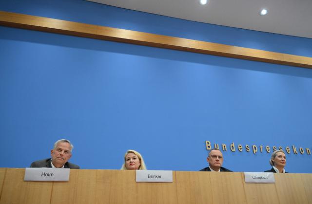 (R-L) The co-leaders of the far-right Alternative for Germany (AfD) party Alice Weidel and Tino Chrupalla as well as the AfD's main candidate for the Berlin state election Kristin Brinker and the AfD-candidate for Mecklenburg-Western Pomerania's State Premier Leif-Erik Holm address a press conference one day after state elections in Berlin and Mecklenburg-Western Pomerania, in Berlin on September 21, 2026. (Photo by RALF HIRSCHBERGER / AFP)