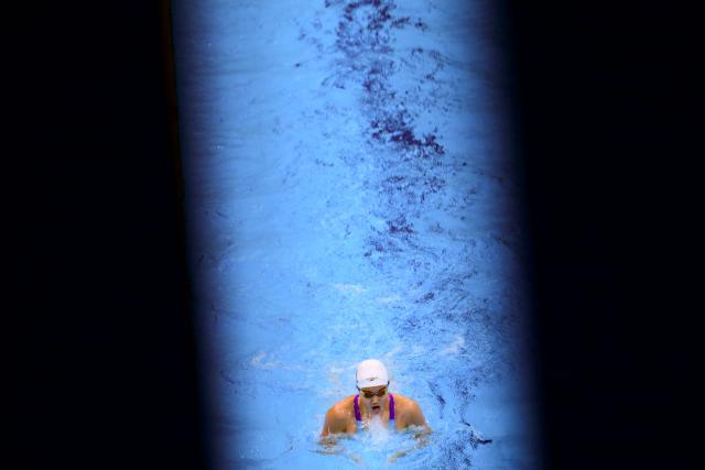 China's Yu Zidi competes in the final of the women's 200m individual medley swimming event during the 2026 Asian Games at the Tokyo Aquatics Centre in Tokyo on September 21, 2026. (Photo by Yuichi YAMAZAKI / AFP)