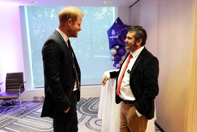 Britain's Prince Harry, Duke of Sussex (L) meets with the winner of the Outstanding Professional, Ian Sinha, during the annual WellChild Awards at the Royal Lancaster Hotel in London on September 21, 2026. WellChild is the national charity for seriously ill children and their families. The WellChild Awards celebrate the inspiring qualities of some of the country's seriously ill young people and the dedication of those who care for and support them. (Photo by Aaron Chown / POOL / AFP)