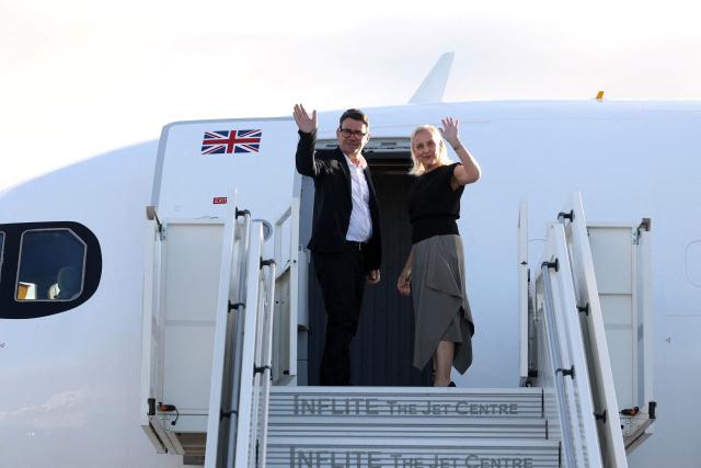 Britain's Prime Minister Andy Burnham and his wife Marie-France van Heel board a plane for the United States, to attend the 81st United Nations General Assembly (UNGA) in New York City, at Stansted Airport, north of London on September 21, 2026. (Photo by Toby Melville / POOL / AFP)