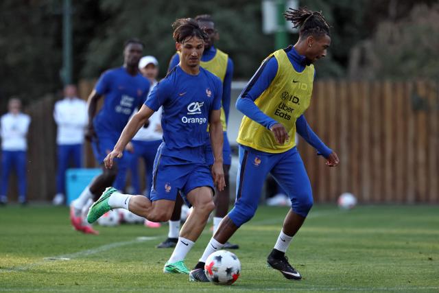France's forward Esteban Lepaul (L) and France's forward Michael Olise take part in a training session four days ahead of France's UEFA Nations League football match against Turkey in Clairefontaine-en-Yvelines outside Paris, on September 21, 2026. The gathering is the first of the French national team under its new coach Zinedine Zidane, appointed on July 28, 2026 on a four-year contract. The Nations League, which France won in 2021, will dominate Zidane's attention in the coming months before the draw for the Euro 2028 qualifying tournament takes place in early December. (Photo by FRANCK FIFE / AFP)
