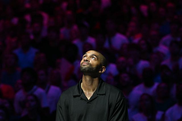 (FILES) France's Nicolas Batum reacts during a presentation to mark his international retirement ahead of a basketball match between France and Spain in preparation for FIBA EuroBasket 2025 at Accor Arena in Paris on August 16, 2025. Nicolas Batum, a two-time Olympic basketball silver medalist with the French national team (2021 and 2024), announced his retirement on September 21, 2026 in a video posted on Instagram, after notably spending 18 seasons in the NBA. (Photo by Martin LELIEVRE / AFP)