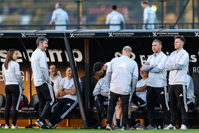 Belgium's head coach Mark van Bommel (2nd L) stands with his staff during a training session ahead of the team's UEFA Nations League football match against Italy at the national training center in Tubize, on September 21, 2026. (Photo by BRUNO FAHY / Belga / AFP) / Belgium OUT