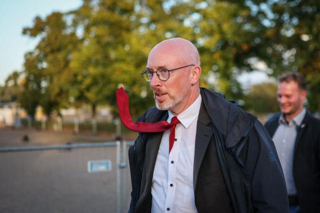 Christian Pegel (SPD), Minister of the Interior of Mecklenburg-Western Pomerania arrives at the TV compound after the announcement of the first exit poll results near the Schwerin Castle, on September 20, 2026, following north-eastern Germany's Mecklenburg-Western-Pomerania's state elections. (Photo by Ronny HARTMANN / AFP)