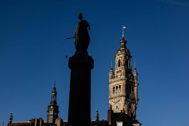 This photograph shows the Column of the Goddess and the Beffroi de la Chambre de Commerce at Lille's Grand'Place, in Lille, northern France, on September 21, 2026. (Photo by Sameer Al-DOUMY / AFP)
