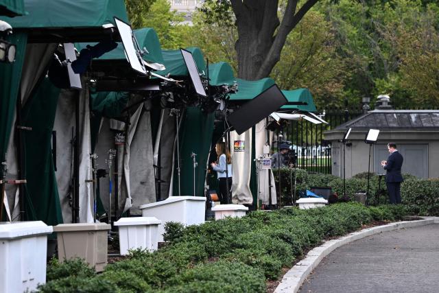 Press tents are seen outside of the White House in Washington, DC, on September 21, 2026. Three leading US news outlets announced on September 21 they will go to court after being banned from the White House, as President Donald Trump claimed that media critical of his administration is a "Cancer" threatening national security. CNN, MS NOW and Politico said in a joint statement that they were filing suit after Trump last week ordered them to be barred from the presidential complex. (Photo by Alex WROBLEWSKI / AFP)