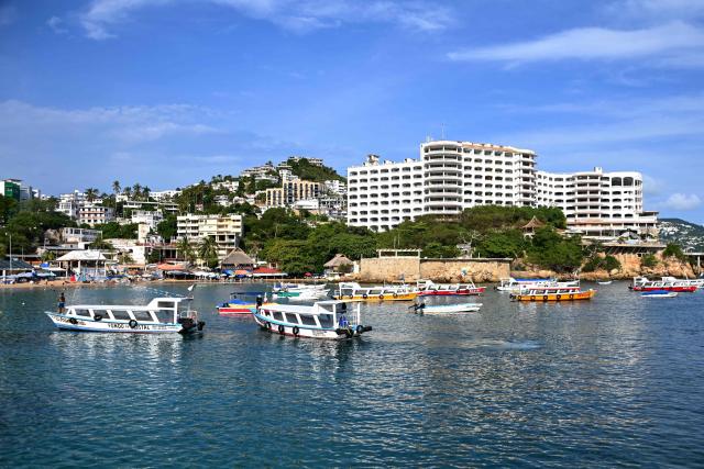 Boats are moored along the beach as residents prepare for the arrival of Hurricane Polo in Acapulco, Guerrero state, Mexico, on September 21, 2026. Hurricane Polo formed off Mexico's Pacific coast on September 21 and is expected to strengthen in the coming days, though it is not forecast to make landfall, the U.S. National Hurricane Centre (NHC) announced. (Photo by Francisco Robles / AFP)