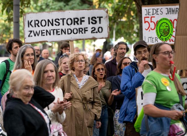 People attend a protest in the city of Linz, Austria on September 11, 2026, against the construction of new Google’s data centre in the Upper Austrian town of Kronstorf. A planned Google data centre promises investment, jobs and a place on the digital map. But not everyone is convinced and local residents have staged potests against the centre. (Photo by Joe Klamar / AFP)