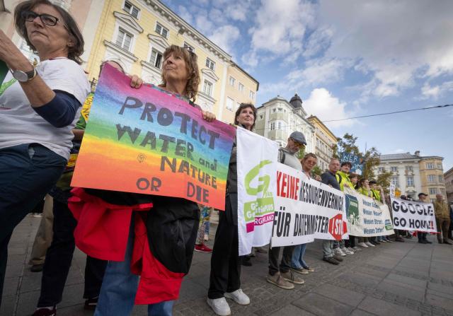 People attend a protest in the city of Linz, Austria on September 11, 2026, against the construction of new Google’s data centre in the Upper Austrian town of Kronstorf. A planned Google data centre promises investment, jobs and a place on the digital map. But not everyone is convinced and local residents have staged potests against the centre. (Photo by Joe Klamar / AFP)