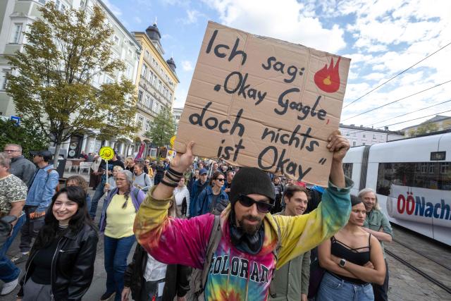 People attend a protest in the city of Linz, Austria on September 11, 2026, against the construction of new Google’s data centre in the Upper Austrian town of Kronstorf. A planned Google data centre promises investment, jobs and a place on the digital map. But not everyone is convinced and local residents have staged potests against the centre. (Photo by Joe Klamar / AFP)