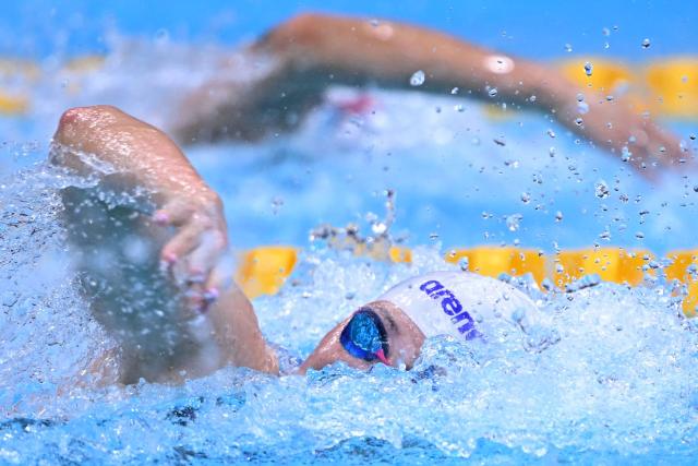 Hong Kong's Siobhan Bernadette Haughey competes in a heat of the women's 100m freestyle swimming event during the 2026 Asian Games at the Tokyo Aquatics Centre in Tokyo on September 22, 2026. (Photo by Yuichi YAMAZAKI / AFP)