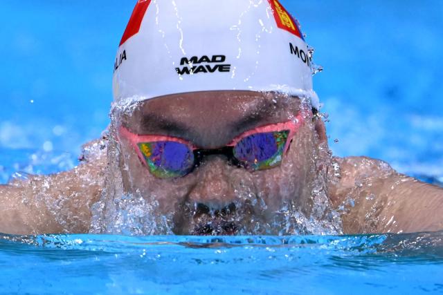 Mongolia's Turmunkh Duurenbayar competes in a heat of the men's 400m individual medley swimming event during the 2026 Asian Games at the Tokyo Aquatics Centre in Tokyo on September 22, 2026. (Photo by Yuichi YAMAZAKI / AFP)