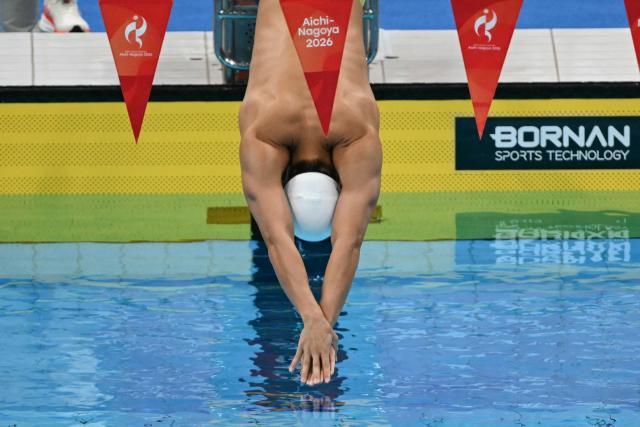 Taiwan's Hsing-hao Wang competes in a heat of the men's 400m individual medley swimming event during the 2026 Asian Games at the Tokyo Aquatics Centre in Tokyo on September 22, 2026. (Photo by ANDREW CABALLERO-REYNOLDS / AFP)