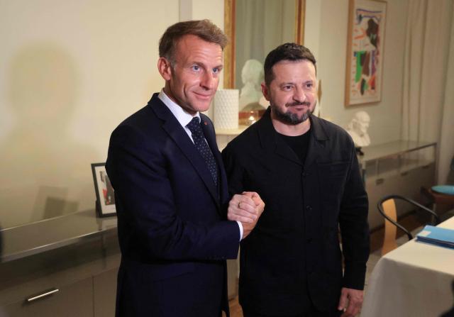 France's President Emmanuel Macron meets with Ukraine's President Volodymyr Zelensky (R) on the sidelines of the 81st United Nations General Assembly in New York City on September 21, 2026. (Photo by Ludovic MARIN / AFP)