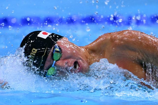 Japan's Shuya Matsumoto competes in a heat of the men's 4 x 100m medley relay swimming event during the 2026 Asian Games at the Tokyo Aquatics Centre in Tokyo on September 22, 2026. (Photo by Yuichi YAMAZAKI / AFP)
