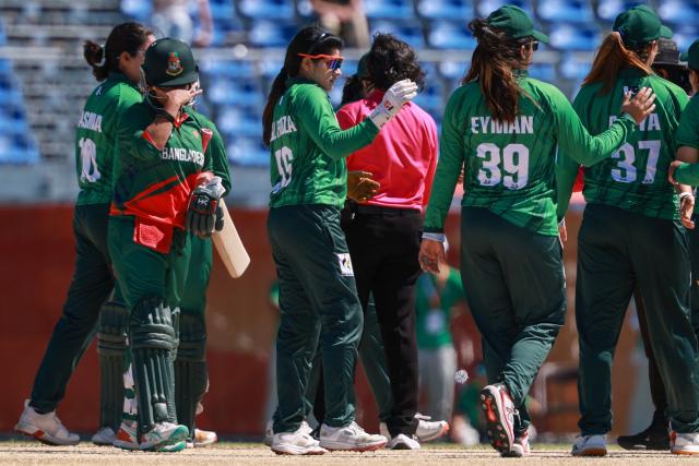 Pakistan's players celebrate their victory as a Bangladesh player (L) reacts in the women's bronze medal cricket match between Bangladesh and Pakistan during the 2026 Asian Games at Korogi Athletic Park in Nisshin, Aichi prefecture on September 22, 2026. (Photo by DAVID GRAY / AFP)