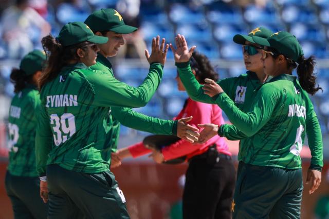 Pakistan's players celebrate their victory in the women's bronze medal cricket match between Bangladesh and Pakistan during the 2026 Asian Games at Korogi Athletic Park in Nisshin, Aichi prefecture on September 22, 2026. (Photo by DAVID GRAY / AFP)