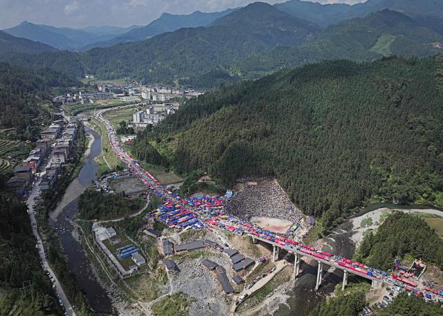 This aerial photo shows a general view of a bullfight in Zaibian located in Congjiang County, in China's southwest Guizhou province on September 19, 2026. (Photo by CN-STR / AFP) / China OUT