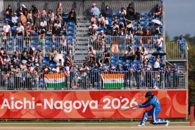 India's Smriti Mandhana hits a shot to be dismissed in the women's gold medal cricket match between India and Sri Lanka during the 2026 Asian Games at Korogi Athletic Park in Nisshin, Aichi prefecture on September 22, 2026. (Photo by DAVID GRAY / AFP)