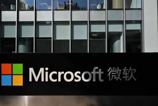 The logo of the US tech company Microsoft is pictured outside its office in Beijing on September 22, 2026. (Photo by ADEK BERRY / AFP)