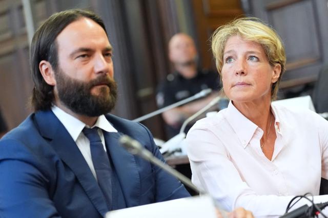 Defendant, German entrepreneur and gastronome Christina Block (R) sits next to her lawyer Ingo Bott prior to the continuation of the trial over alleged child abduction, at the Criminal Court in Hamburg, northern Germany, on September 22, 2026. The public prosecutor's office accuses Block, heiress of a steakhouse chain, of ordering the abduction of her daughter, born in 2010, and her son, born in 2013. According to the indictment, the background to this is an escalating custody dispute over many years between Block and her former husband, who have four children together. (Photo by Marcus Brandt / POOL / AFP)