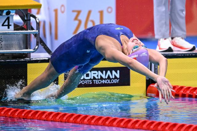 China's Peng Xuwei competes in the final of the women's 200m backstroke swimming event during the 2026 Asian Games at the Tokyo Aquatics Centre in Tokyo on September 22, 2026. (Photo by Yuichi YAMAZAKI / AFP)