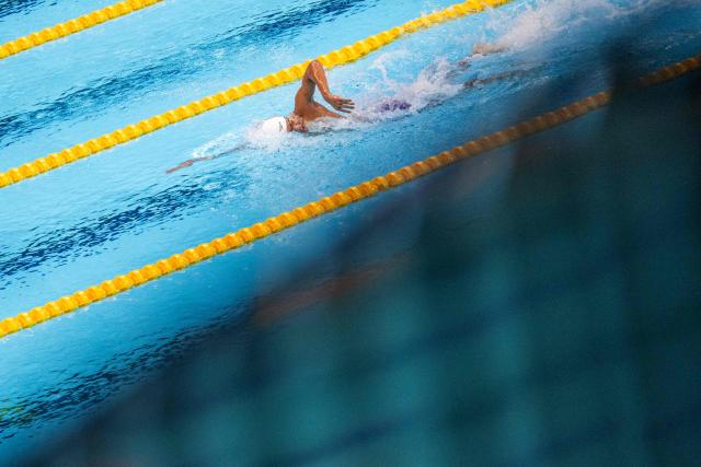 China's Zhang Zhanshuo competes in the final A of the men's 1500m freestyle swimming event during the 2026 Asian Games at the Tokyo Aquatics Centre in Tokyo on September 22, 2026. (Photo by ANDREW CABALLERO-REYNOLDS / AFP)