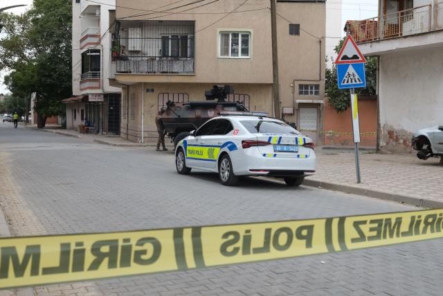 An armoured police vehicle is seen behind a police barrier near a high school where a gunman opened fire wounding eleven people and was detained shortly afterwards, in Turgutlu, an area west of the resort city of Izmir, on September 22, 2026. A teenager opened fire outside a high school in western Turkey on September 22, wounding 11 people before being detained by police, a minister said. The incident happened around 8:00 am (0500 GMT) in Turgutlu in Manisa province, near the western resort city of Izmir, the regional governor's office said. (Photo by Ilker ERAY / AFP)