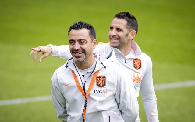 Netherlands' head coach Xavi Hernandez (L) leads a training session as part of the team's preparations for upcoming UEFA Nations League football matches at the KNVB Campus in Zeist on September 22, 2026. (Photo by Robin van Lonkhuijsen / ANP / AFP) / Netherlands OUT