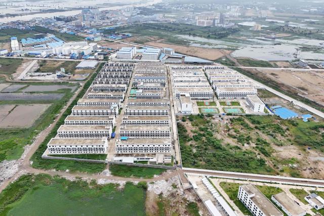 An aerial view of a closed online scam compound under the Jin Zi Hui Property Management is seen in Kandal province on September 22, 2026. Cambodia this week hosts officials from more than 20 countries for a conference on combating online scammers, seeking to showcase its own crackdown under increasing international pressure. (Photo by Suy SE / AFP)