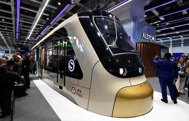A mockup at scale of Alstom's S-Bahn commuter train for the western German Rhineland region is on display at the InnoTrans International Trade Fair for Transport Technology on September 22, 2026 in Berlin. From September 22 to 25, 2026, around 600 companies from the Railway Infrastructure and Tunnel Construction sectors will present their latest products and services, ranging from digital planning and monitoring systems to innovative construction methods and sustainable solutions for Tunnel Construction and infrastructure management. (Photo by John MACDOUGALL / AFP)